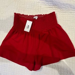 TCEC smocked red shorts size NWT. Medium. $29